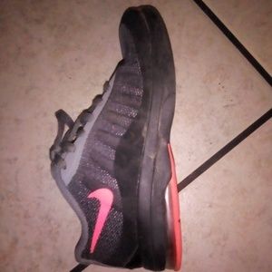 Nike girl tennis shoes size 11.